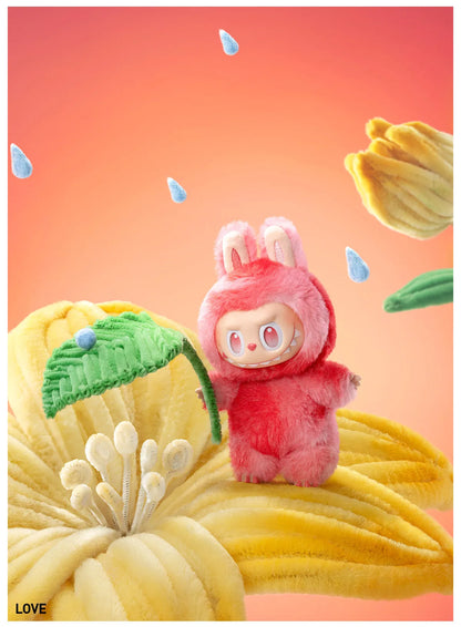 Plush toy in a red outfit with bunny ears standing on a yellow textured surface with flowers and raindrops.