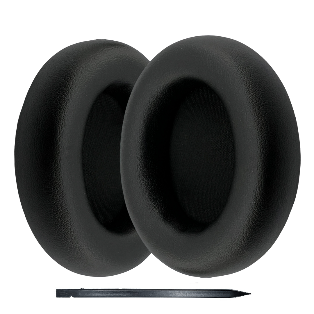 Black earbud covers with a small tool on a white background