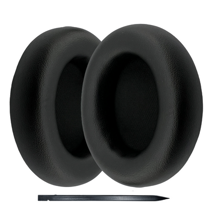 Black earbud covers with a small tool on a white background