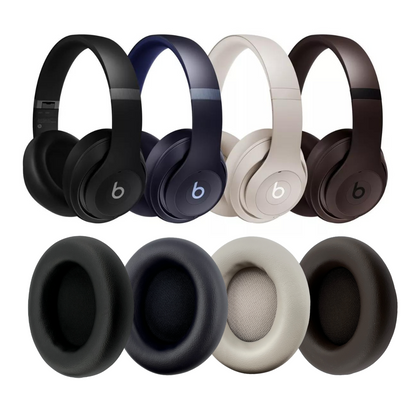 Set of Beats headphones in various colors with ear pads displayed below on a white background.